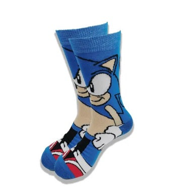 Sonic the hedgehod pair of socks. left facing. sonic wearing red and blue shoes. sock is 90% blue